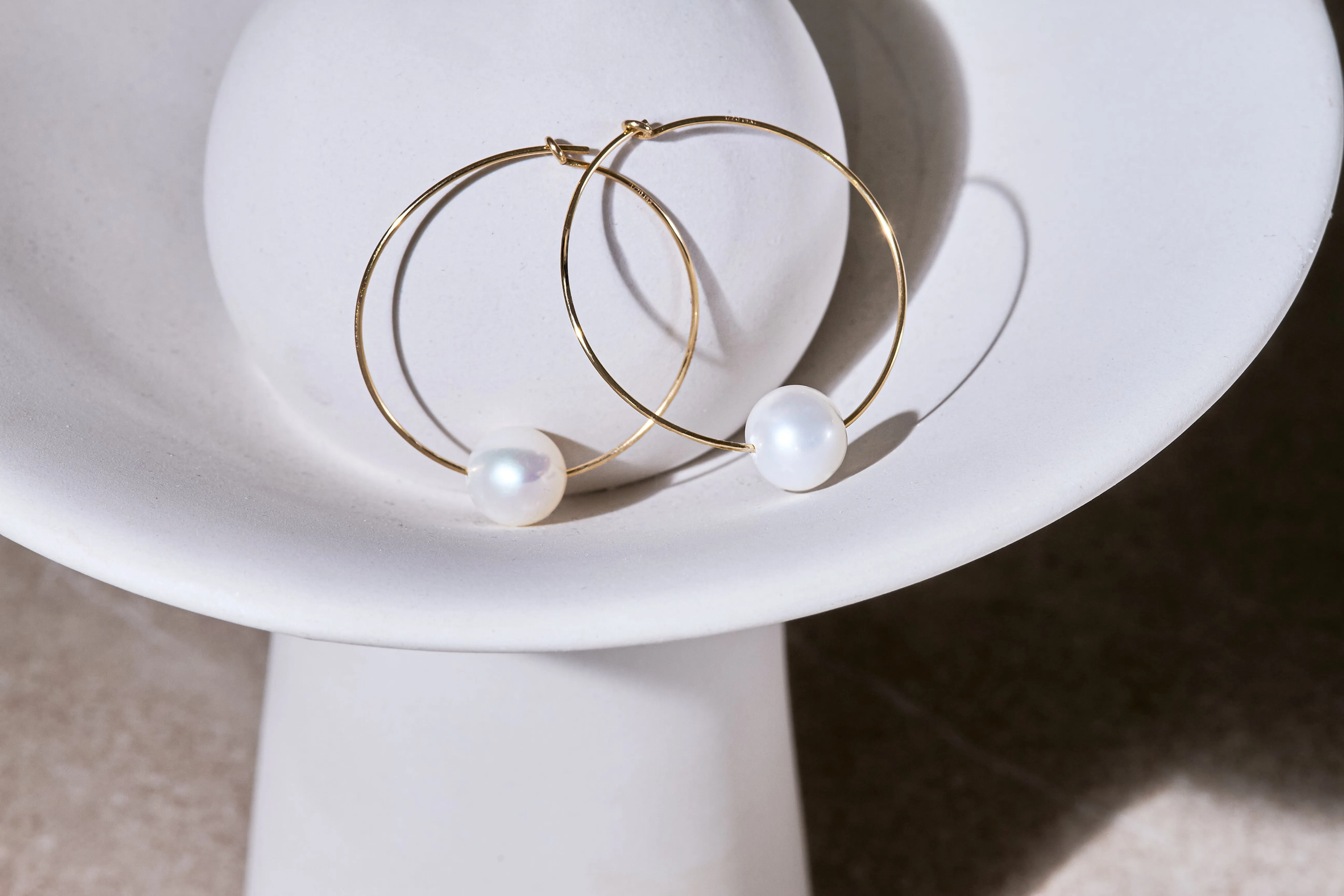 Gratia large gold plate hoop earrings with almost round cultured freshwater pearls